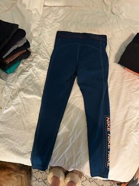 Nike women’s Navy Blue Leggings with Coral Logo Stripe